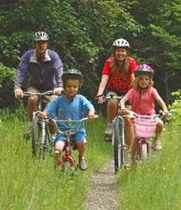 Family riding bikes - Virginia Creeper Trail.